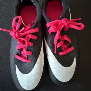 Nike Black and White Cleats with Pink Accents